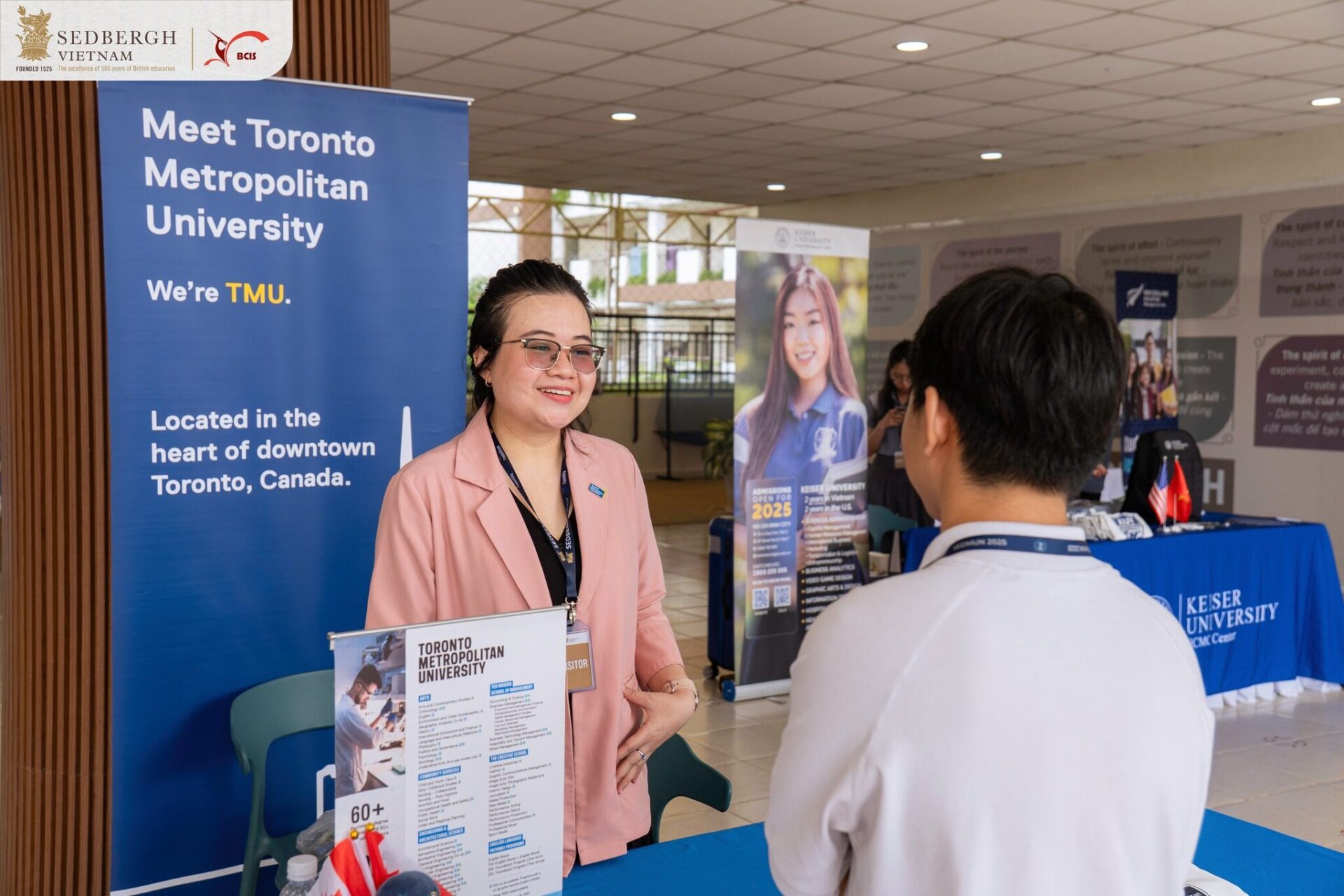 A Toronto Metropolitan University representative advising parents and students